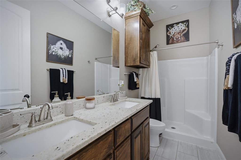 1065 Old Highway Howe, TX 75459 - Photo 27 of 39 Full bath featuring double vanity and a stall shower