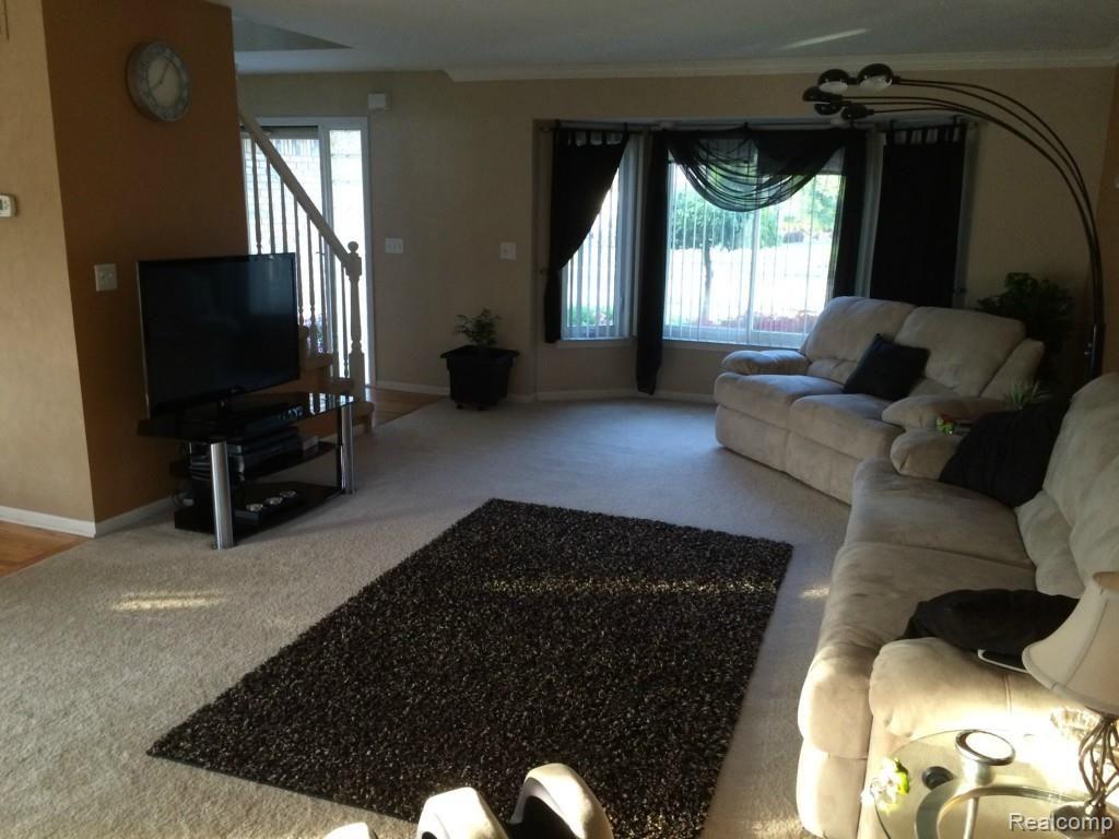 51549 Promenade Lane New Baltimore, MI 48047 - Photo 7 of 30 living room 2.jpg
