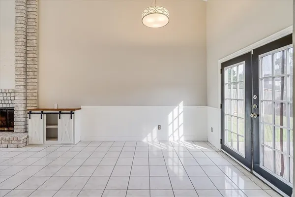 a view of a room with a large window