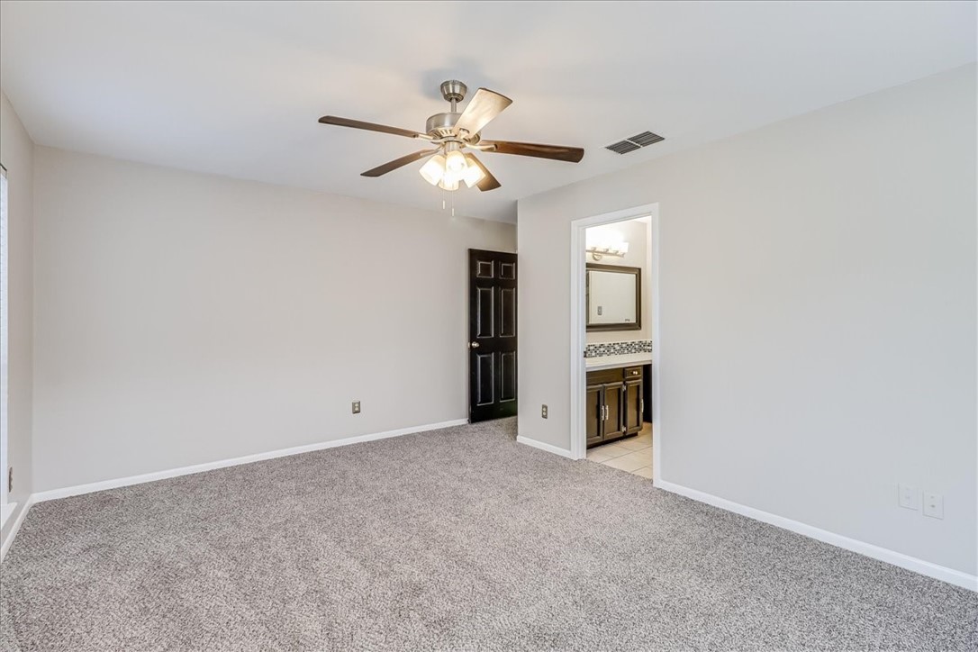 2938 River Crest Road Corpus Christi, TX 78415 - Photo 21 of 39 a view of an empty room with a window