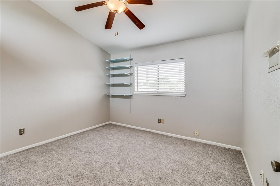 2938 River Crest Road Corpus Christi, TX 78415 - Photo 31 of 39 an empty room with windows