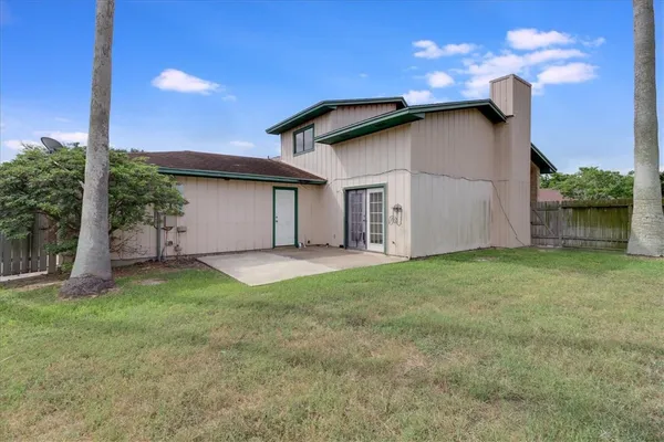 a view of a garden with a fountain
