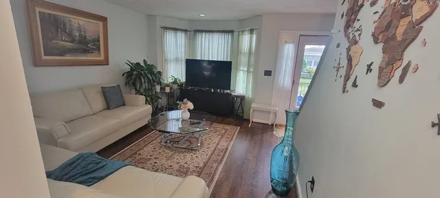 a living room with furniture and a couch