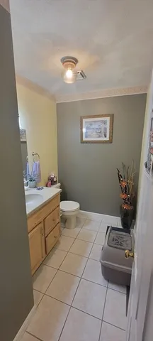 a bathroom with a sink and toilet