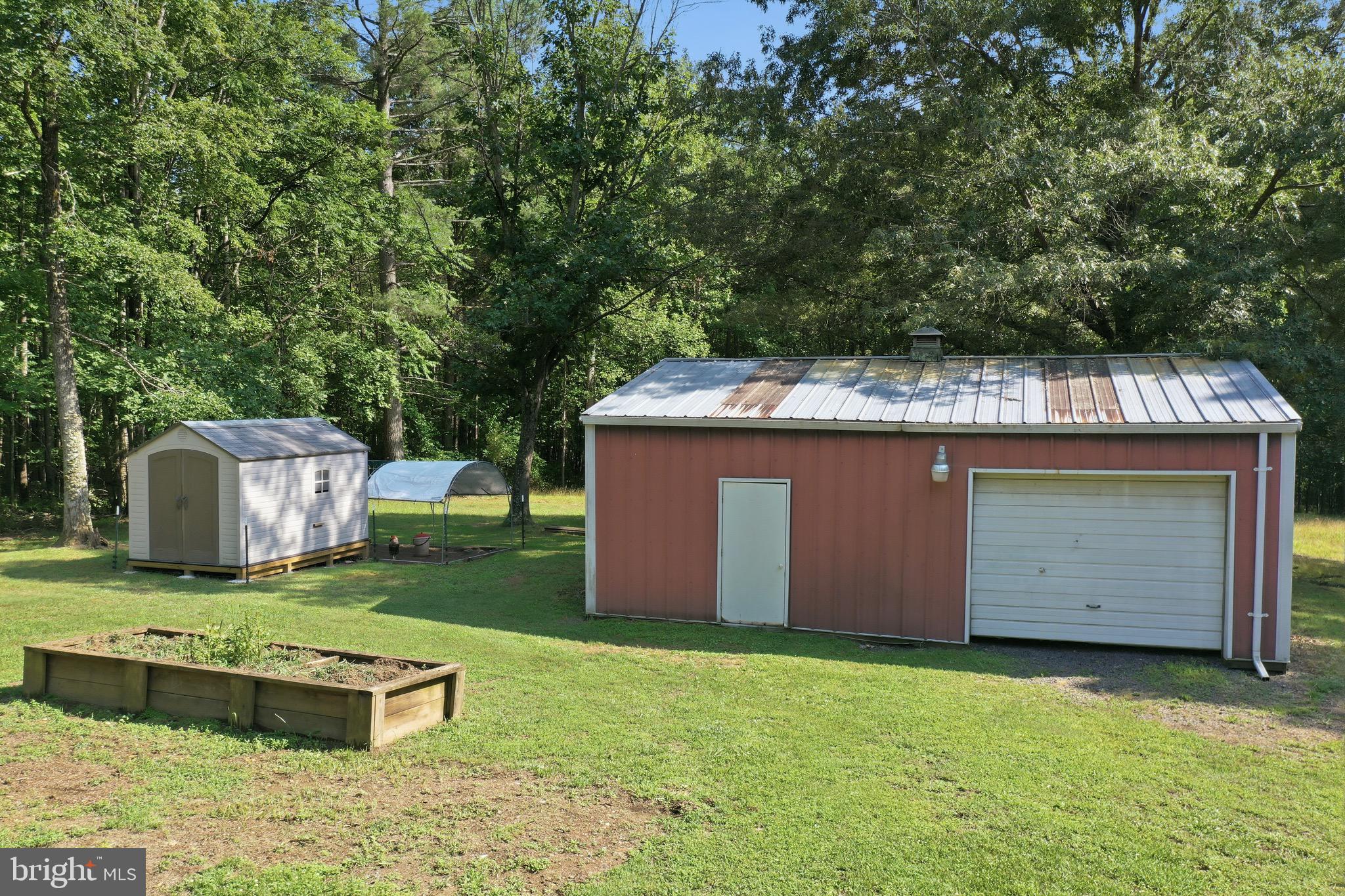 78 Lizzie Mills Road Castleton, VA 22716 - Photo 42 of 53 Detached garage and chicken coop with covered run