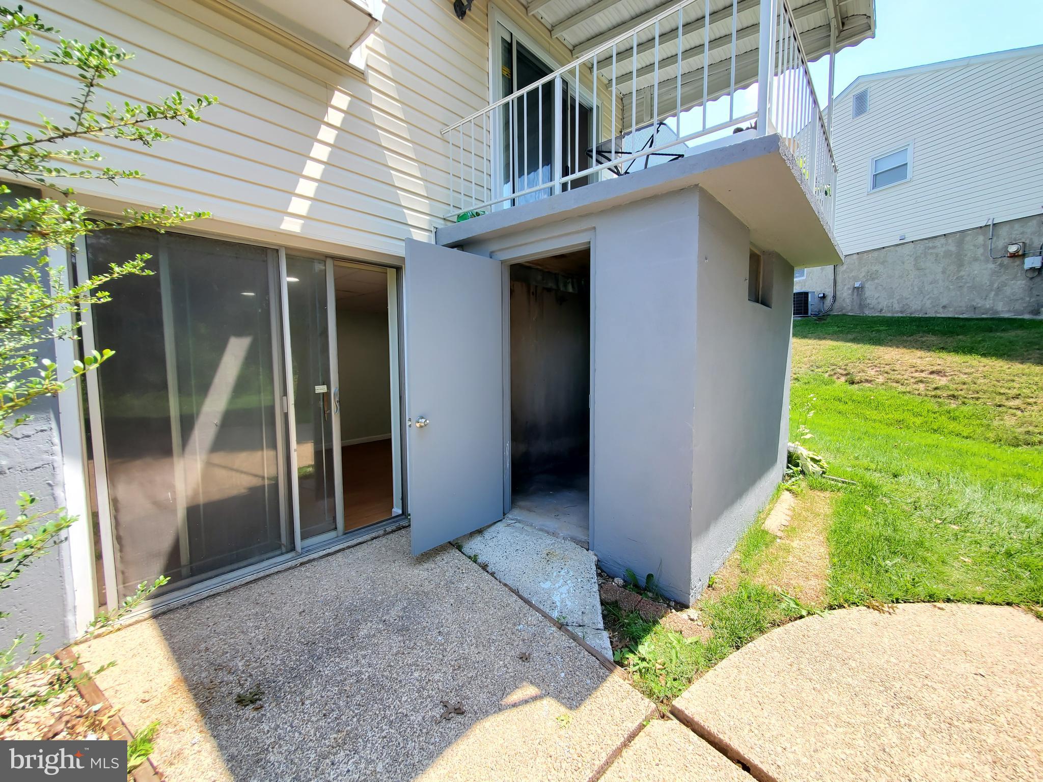 1512 Customs Road Baltimore, MD 21237 - Photo 37 of 43 a view of a house with a porch