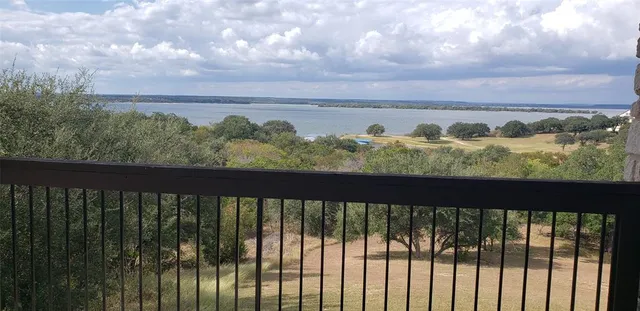 a view of a balcony with an outdoor space