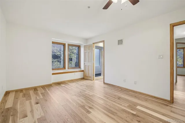 a spacious bathroom with a double vanity sink and a mirror