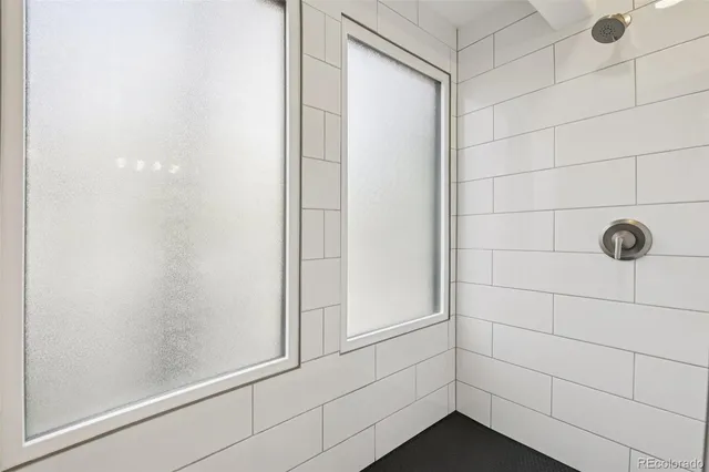 a work room with furniture and potted plants