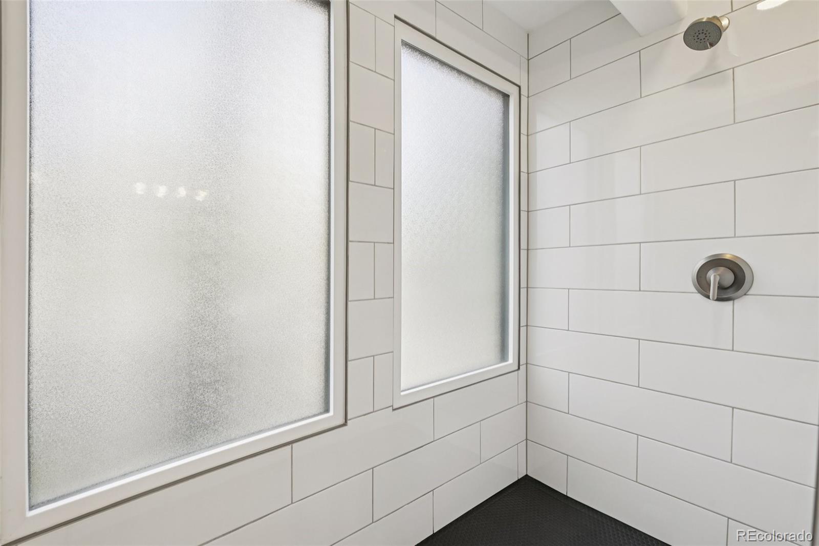 23674 Pondview Place, Unit B Golden, CO 80401 - Photo 16 of 35 a bathroom with a shower