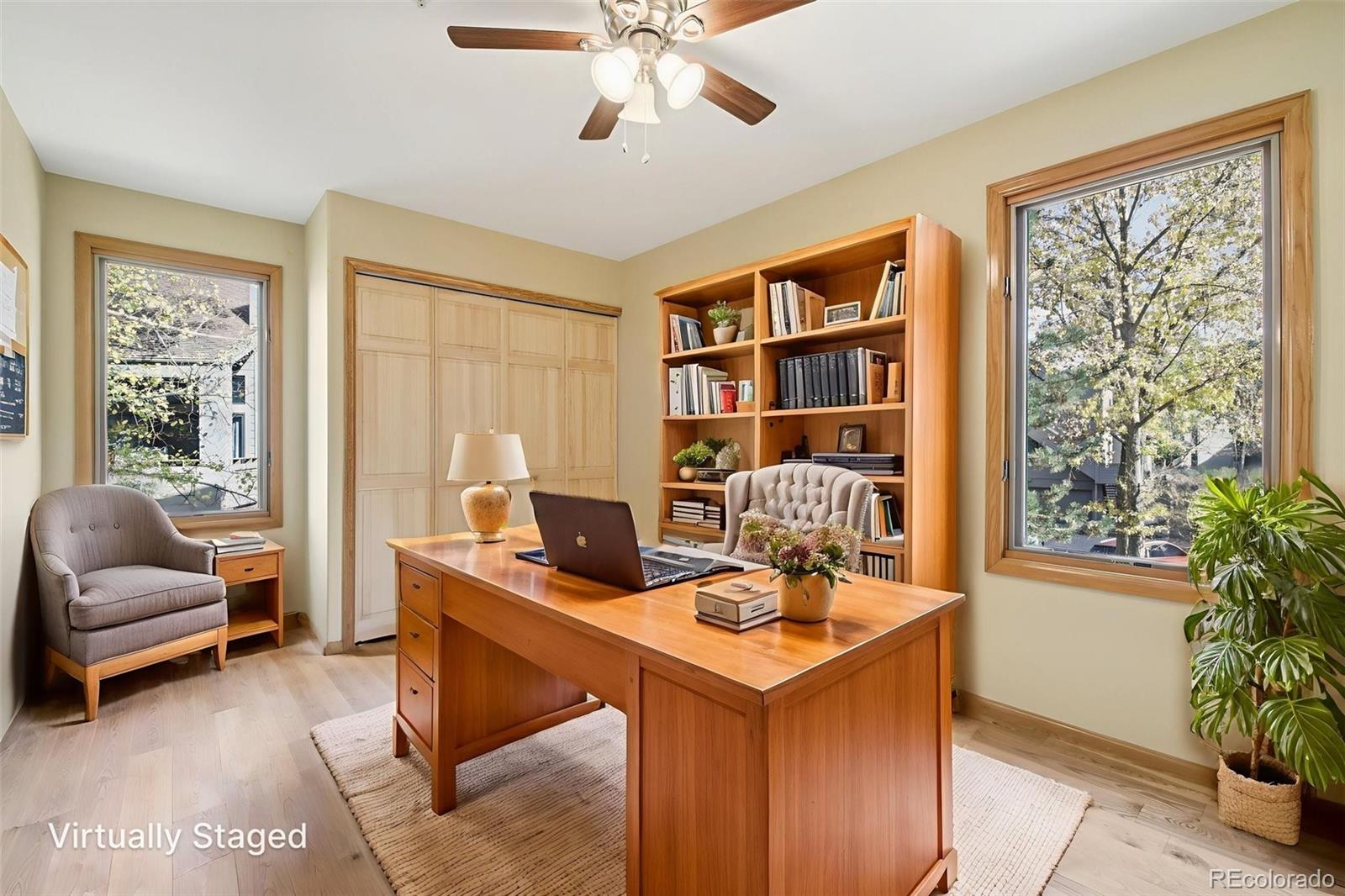 23674 Pondview Place, Unit B Golden, CO 80401 - Photo 17 of 35 a work room with furniture and potted plants