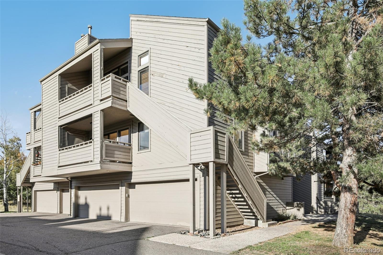 23674 Pondview Place, Unit B Golden, CO 80401 - Photo 23 of 35 a view of a house with a yard