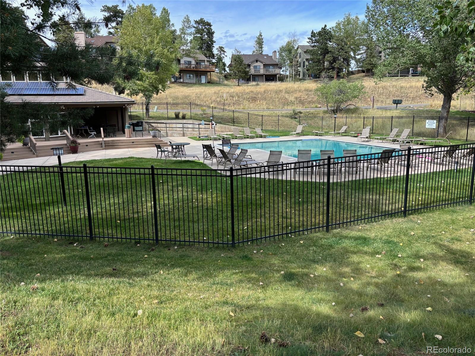 23674 Pondview Place, Unit B Golden, CO 80401 - Photo 25 of 35 a view of a backyard