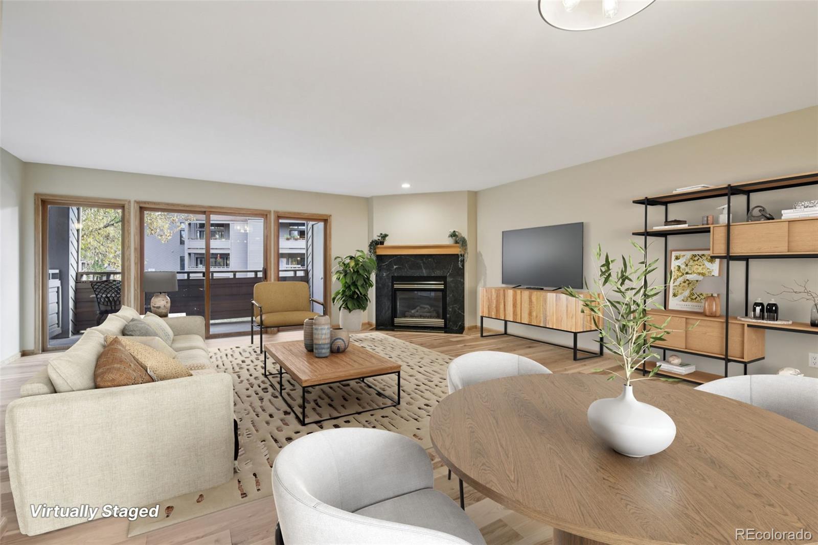 23674 Pondview Place, Unit B Golden, CO 80401 - Photo 3 of 35 a living room with furniture and a flat screen tv
