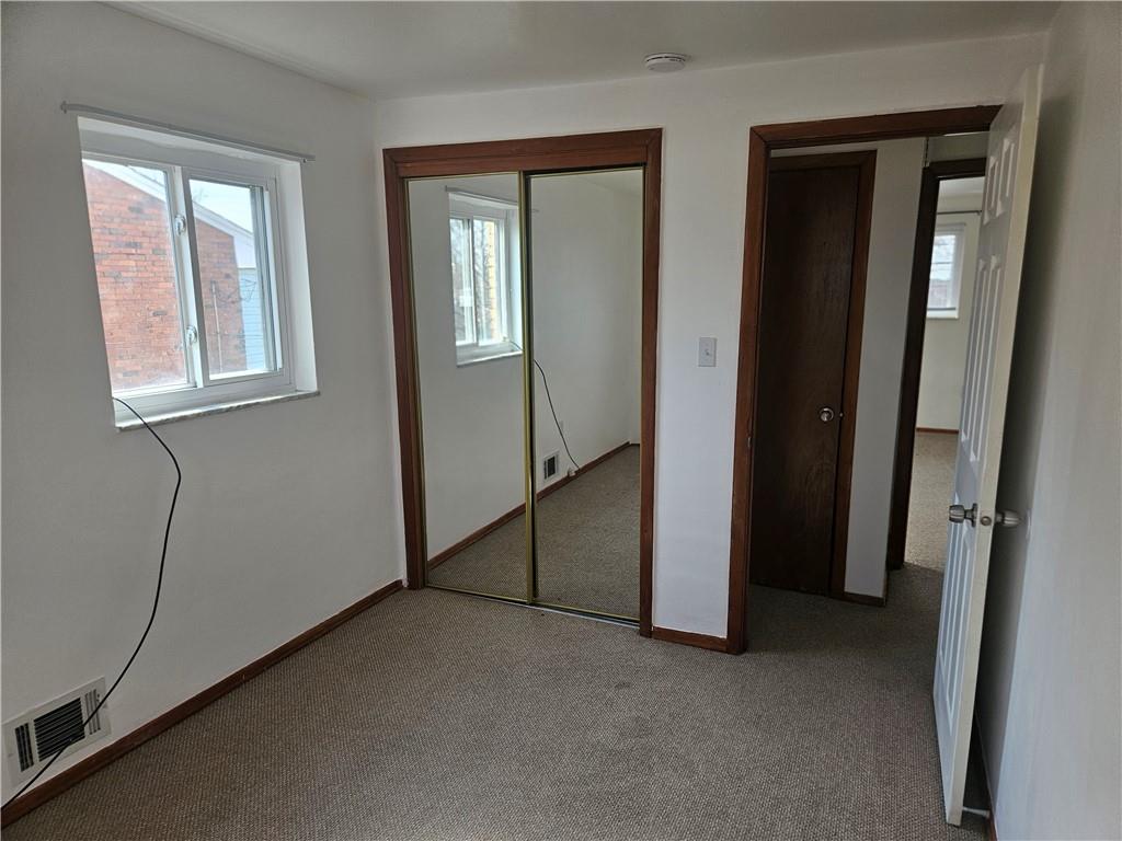 812 Westbury Road, Unit B North Versailles, PA 15137 - Photo 17 of 29 an empty room with windows