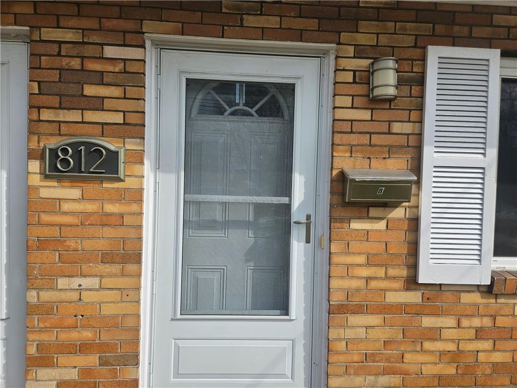 812 Westbury Road, Unit B North Versailles, PA 15137 - Photo 2 of 29 a front view of a house with a window