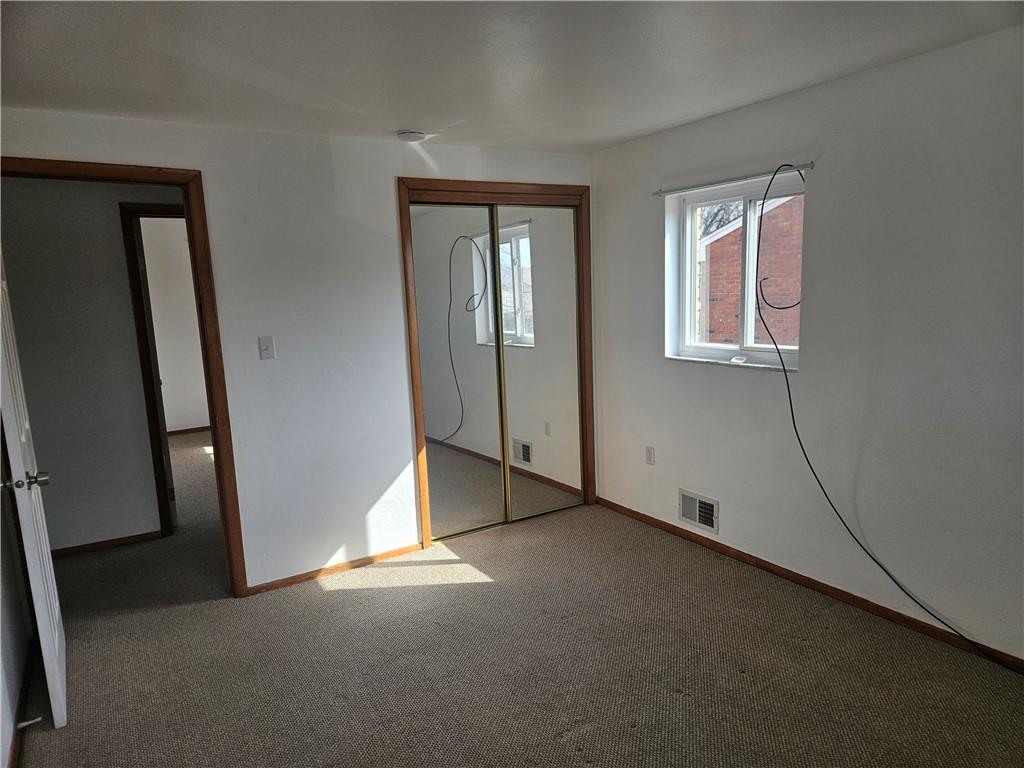 812 Westbury Road, Unit B North Versailles, PA 15137 - Photo 21 of 29 an empty room with windows