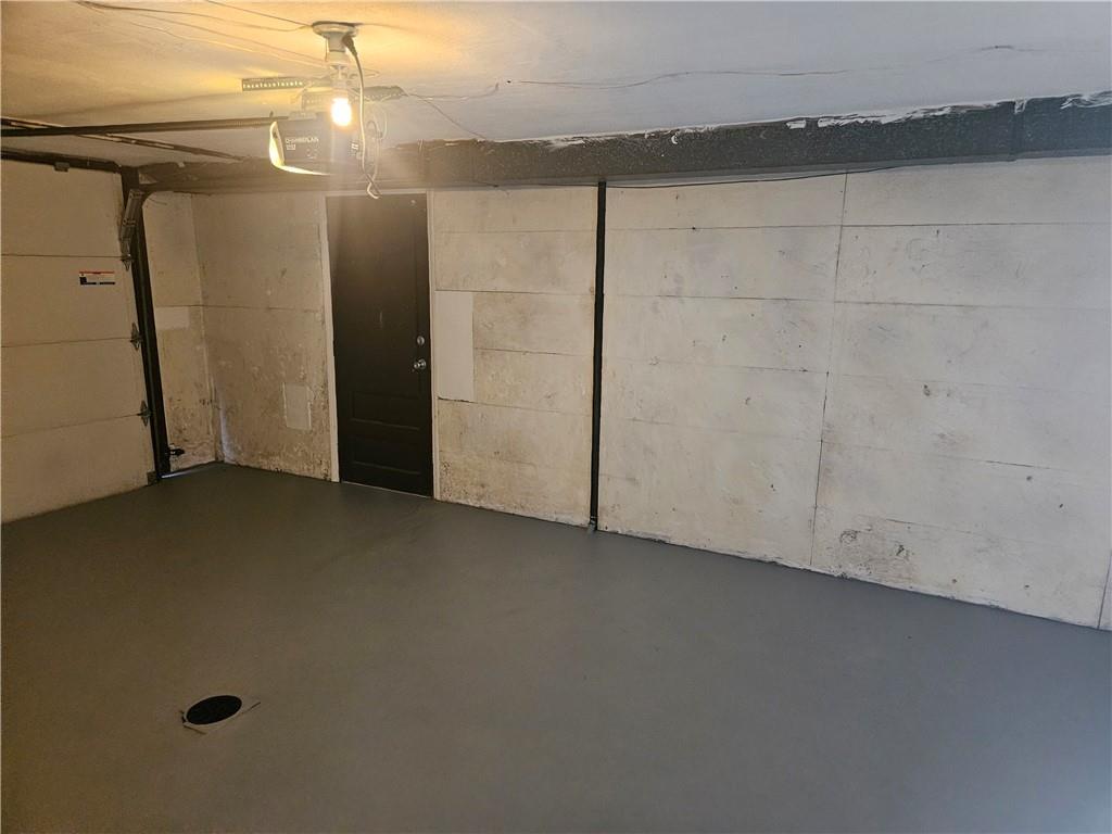 812 Westbury Road, Unit B North Versailles, PA 15137 - Photo 26 of 29 an empty room with a ceiling fan and entryway