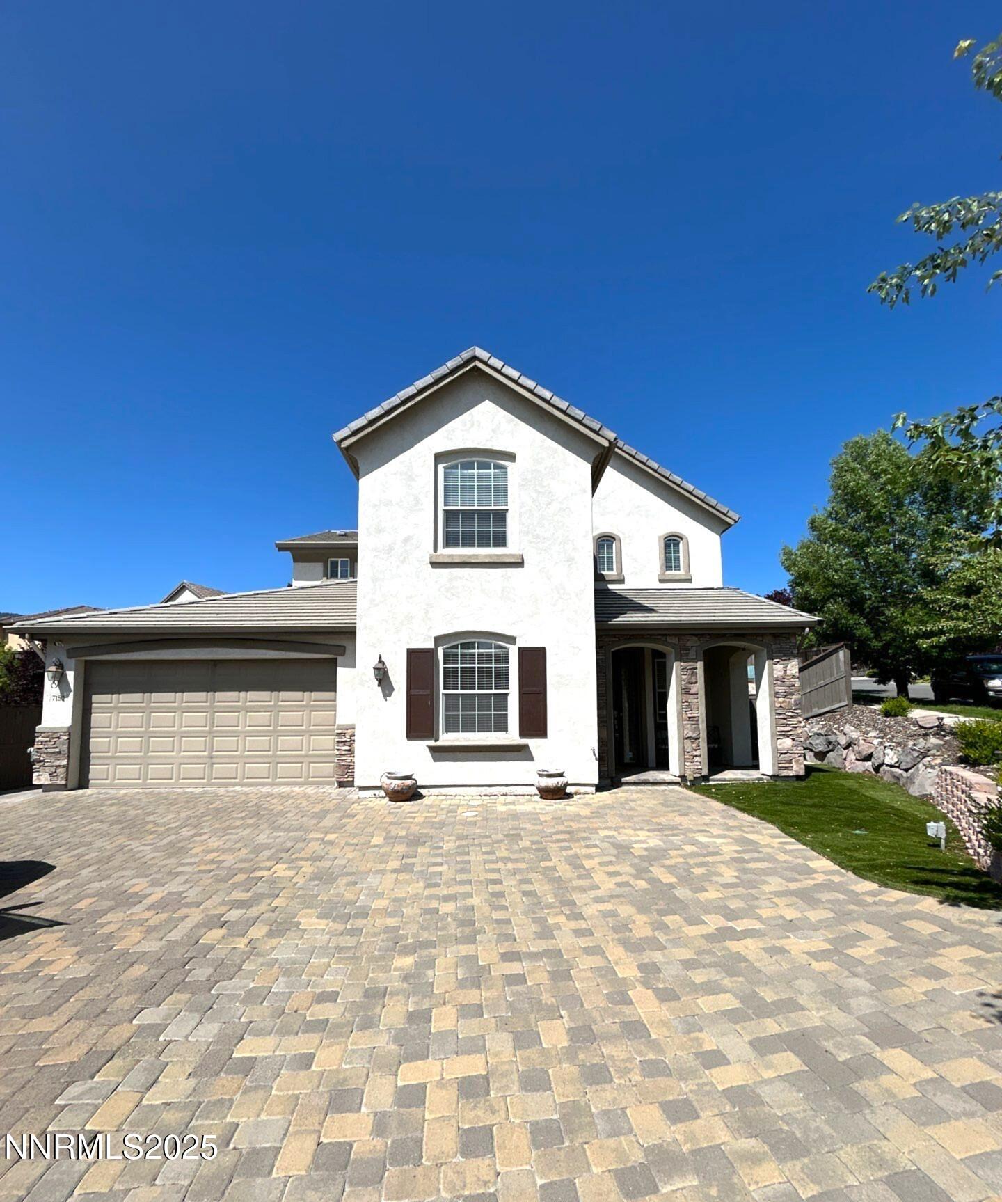 7150 Provence Circle Reno, NV 89523 - Photo 1 of 22 a view of a house with a patio