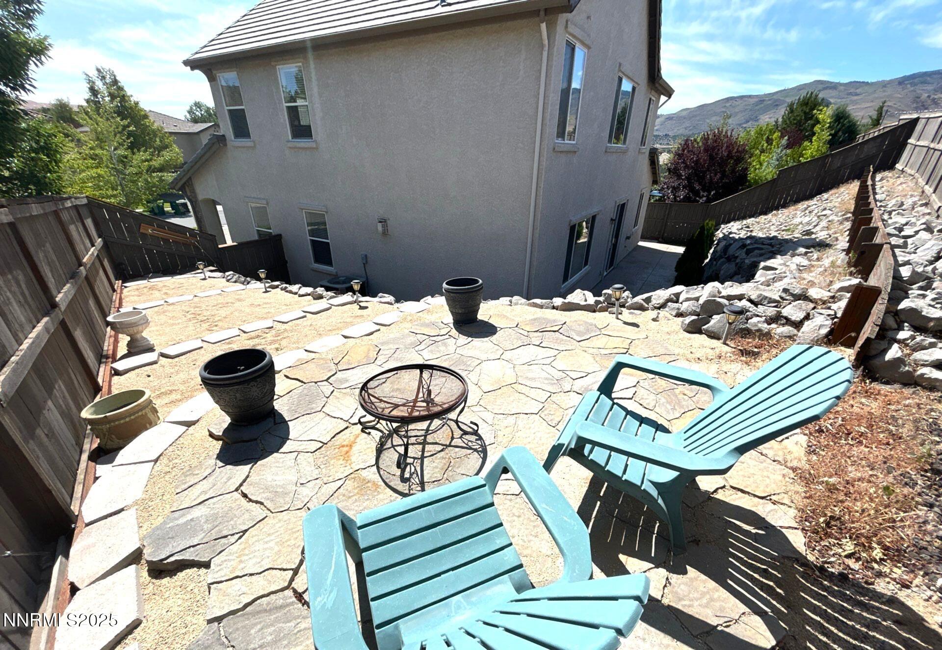 7150 Provence Circle Reno, NV 89523 - Photo 20 of 22 a view of a patio with table and chairs