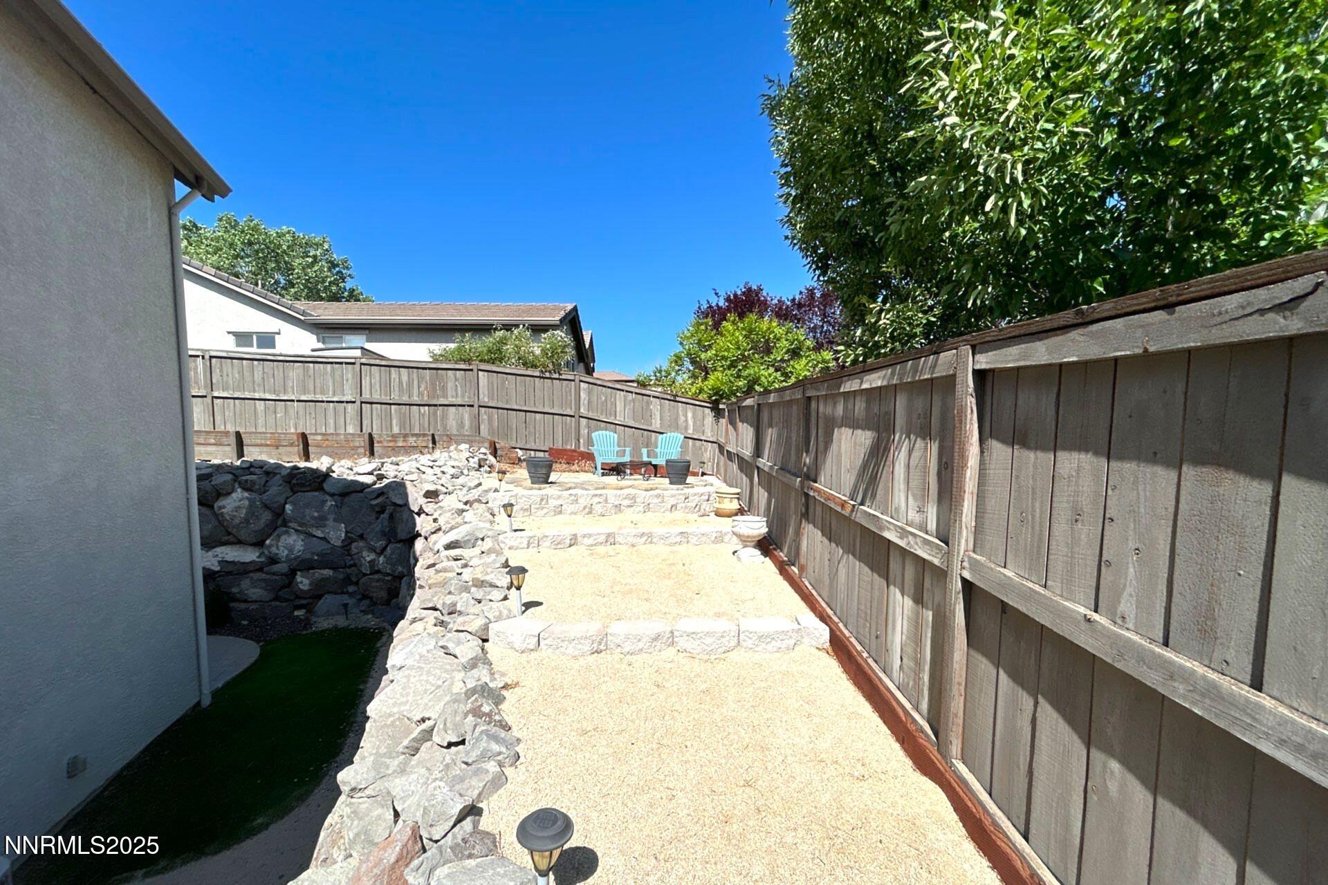 7150 Provence Circle Reno, NV 89523 - Photo 21 of 22 a view of balcony with wooden floor and fence