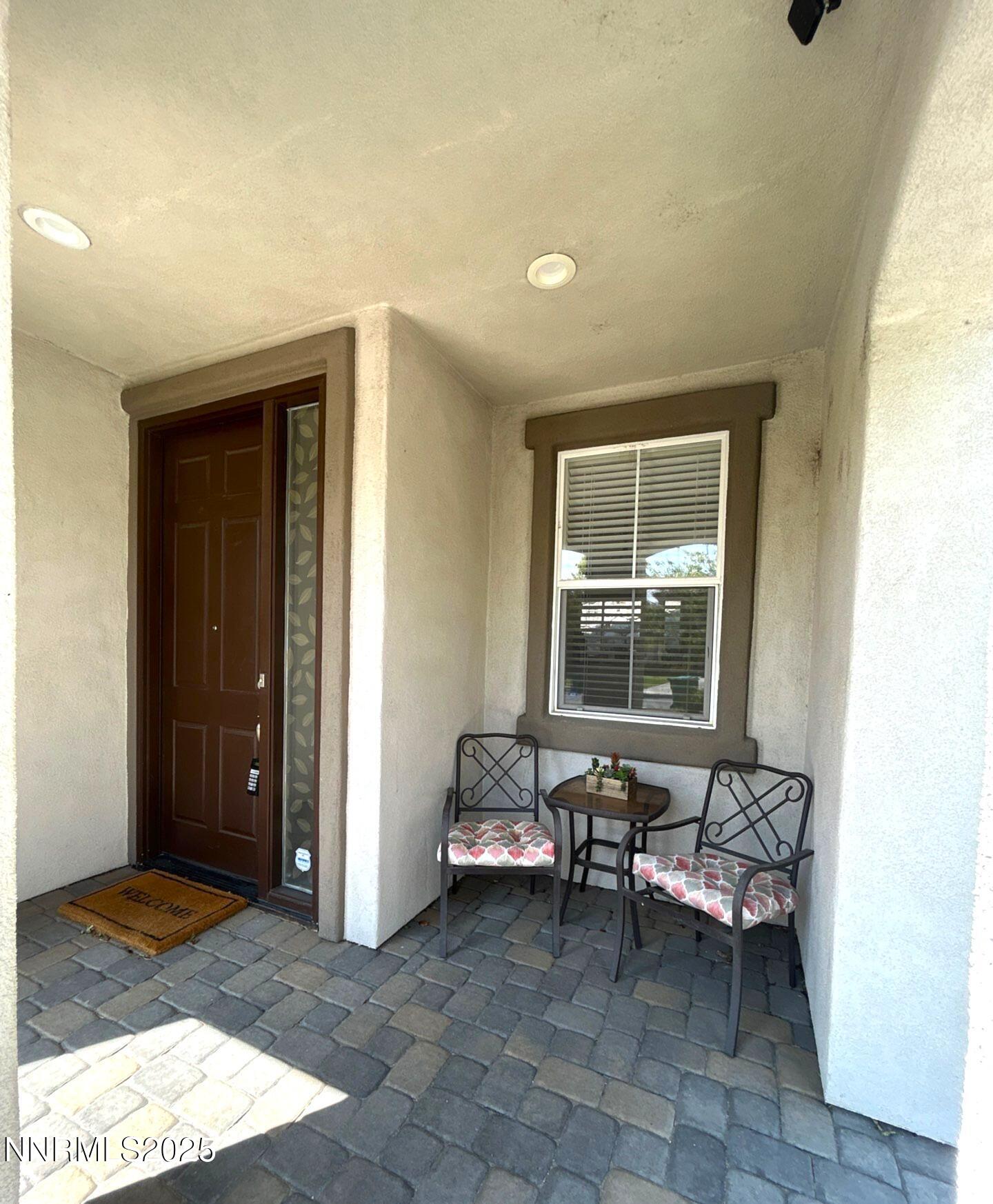 7150 Provence Circle Reno, NV 89523 - Photo 4 of 22 a living room with furniture and a window