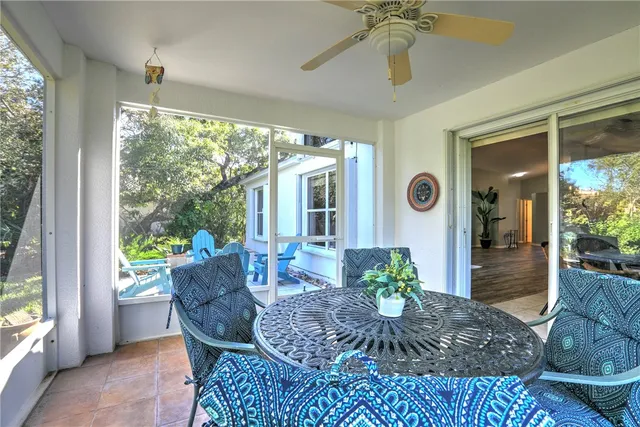 a street sign that is in front of flowers