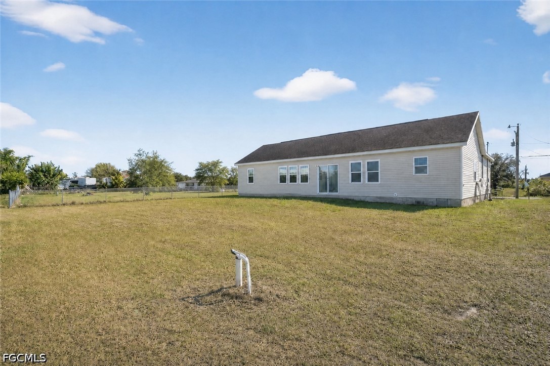 2808 34th Street Southwest Lehigh Acres, FL 33976 - Photo 11 of 14 a view of outdoor space and yard