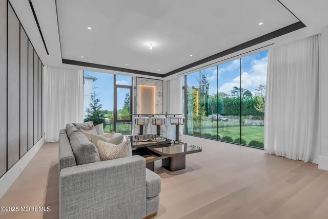 a spacious bedroom with a bed and a shower