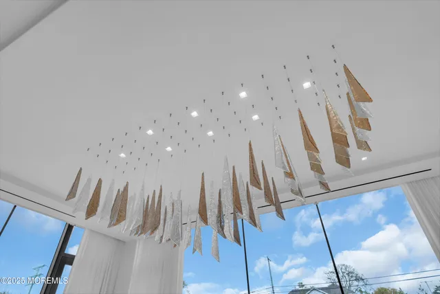 a spacious bedroom with a large bed and a window