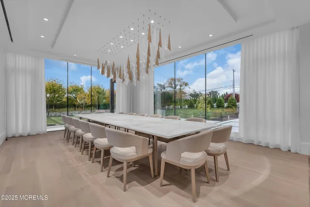 a view of swimming pool with outdoor seating