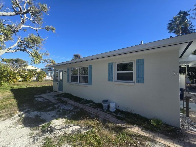 107 29th Street Holmes Beach, FL 34217 - Photo 13 of 13 a house view with a backyard space