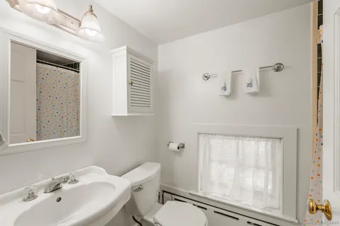 a view of a chairs and table in patio