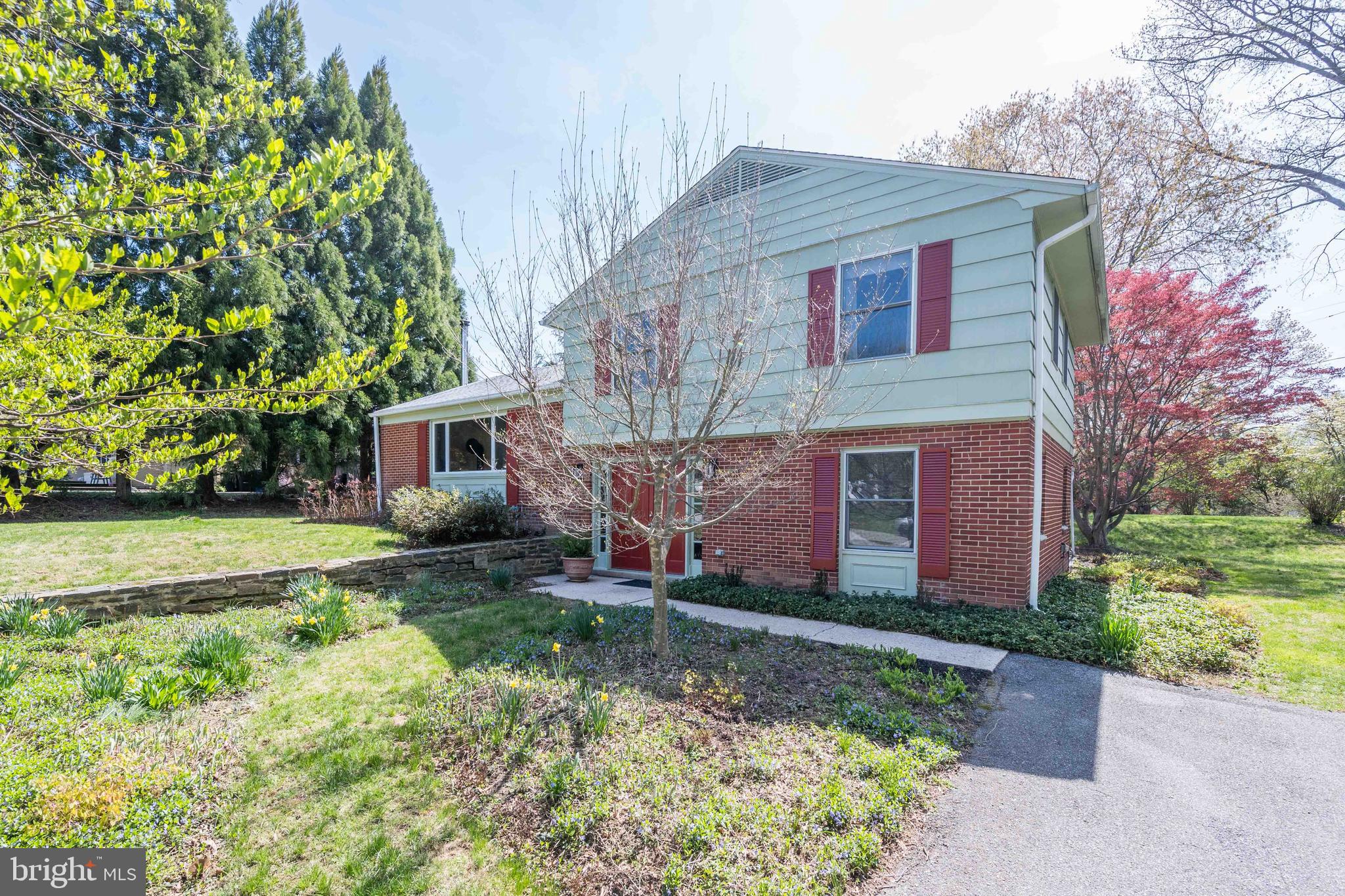 9221 Spring Valley Road Ellicott City, MD 21043 - Photo 2 of 47 a front view of house with yard
