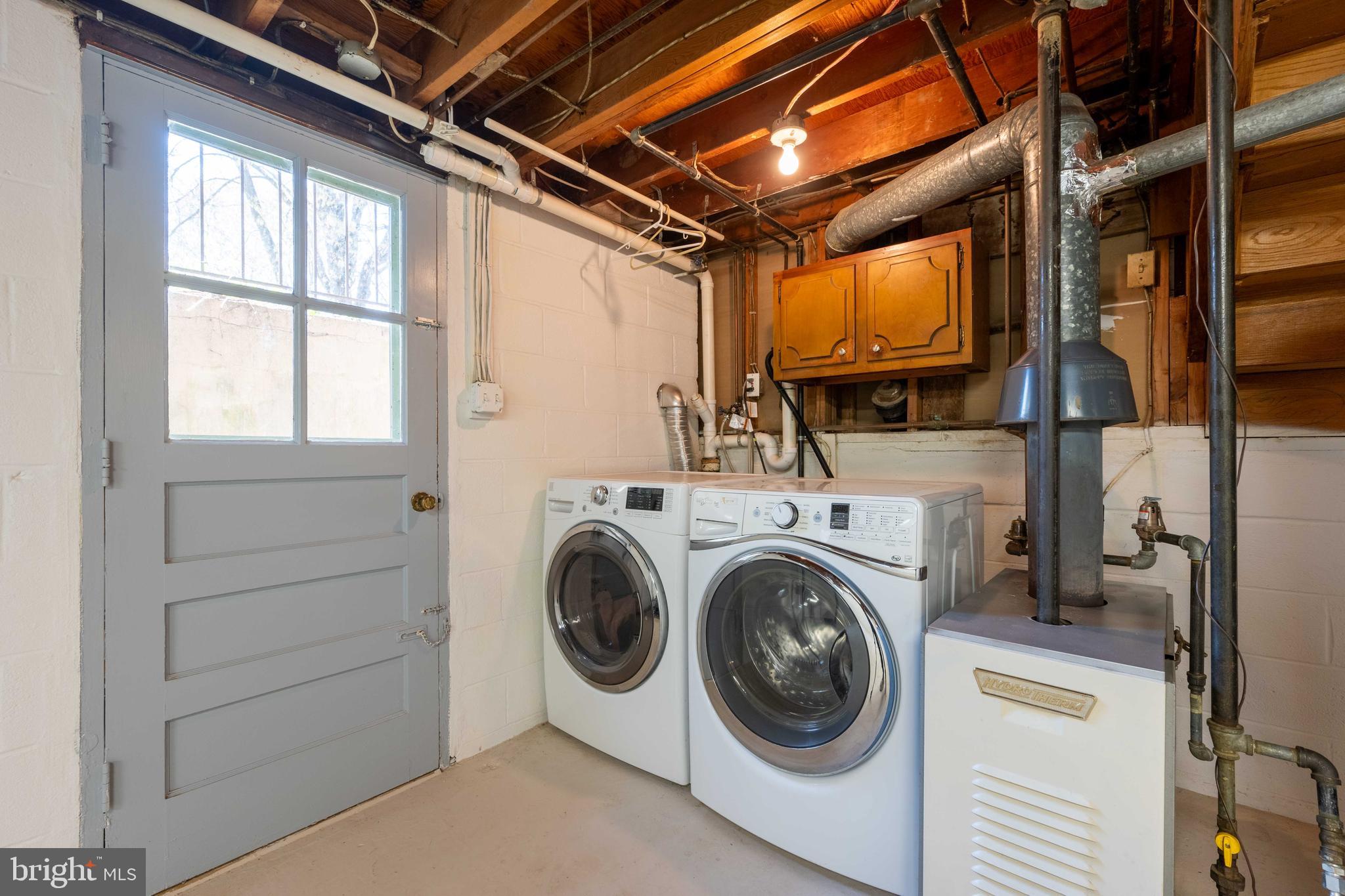 9221 Spring Valley Road Ellicott City, MD 21043 - Photo 34 of 47 a utility room with dryer and washer
