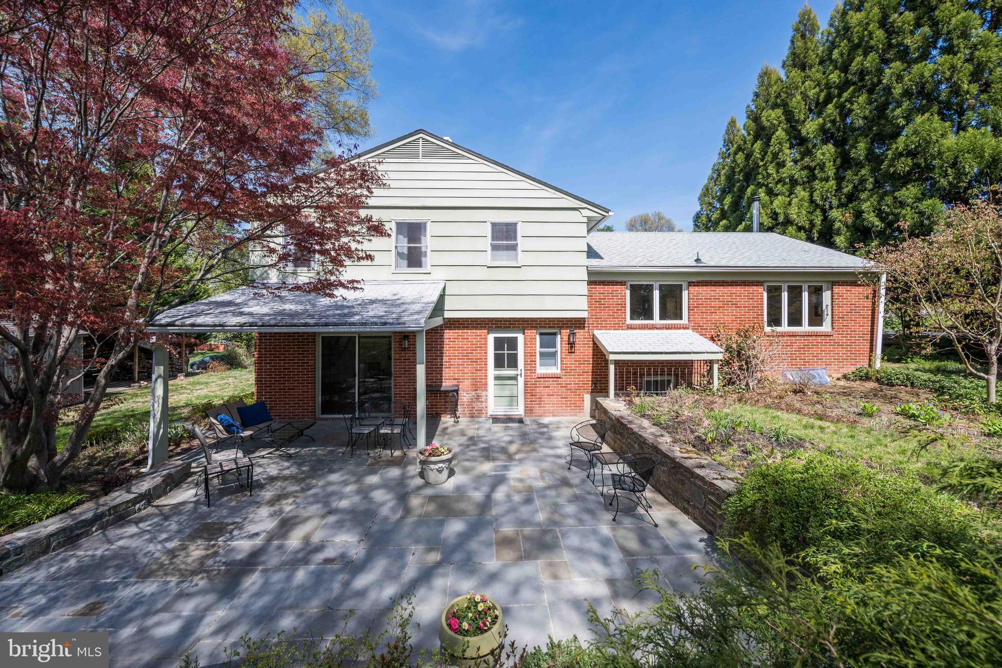 9221 Spring Valley Road Ellicott City, MD 21043 - Photo 37 of 47 a front view of a house with garden