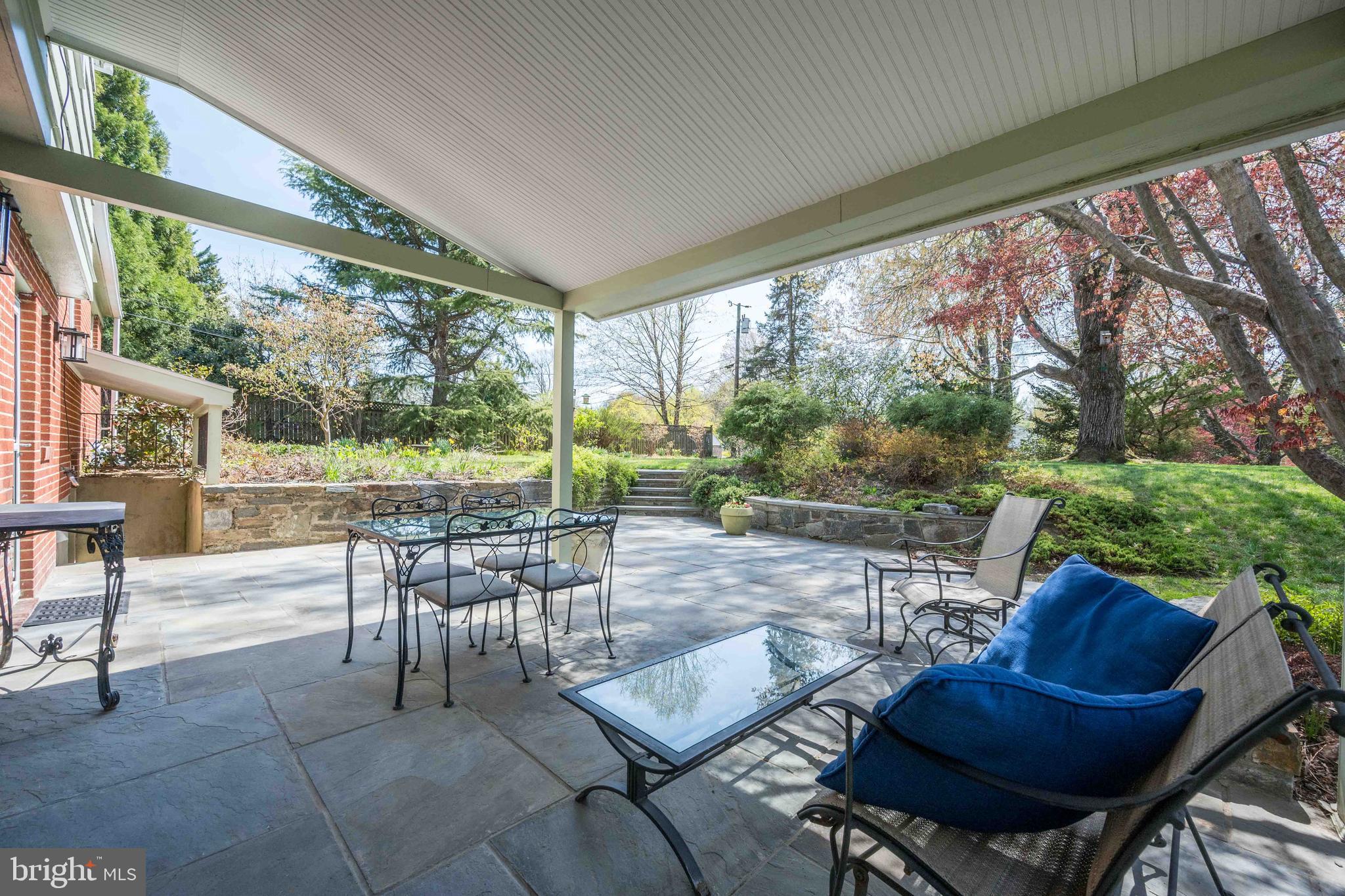 9221 Spring Valley Road Ellicott City, MD 21043 - Photo 39 of 47 a view of a patio with chairs and backyard