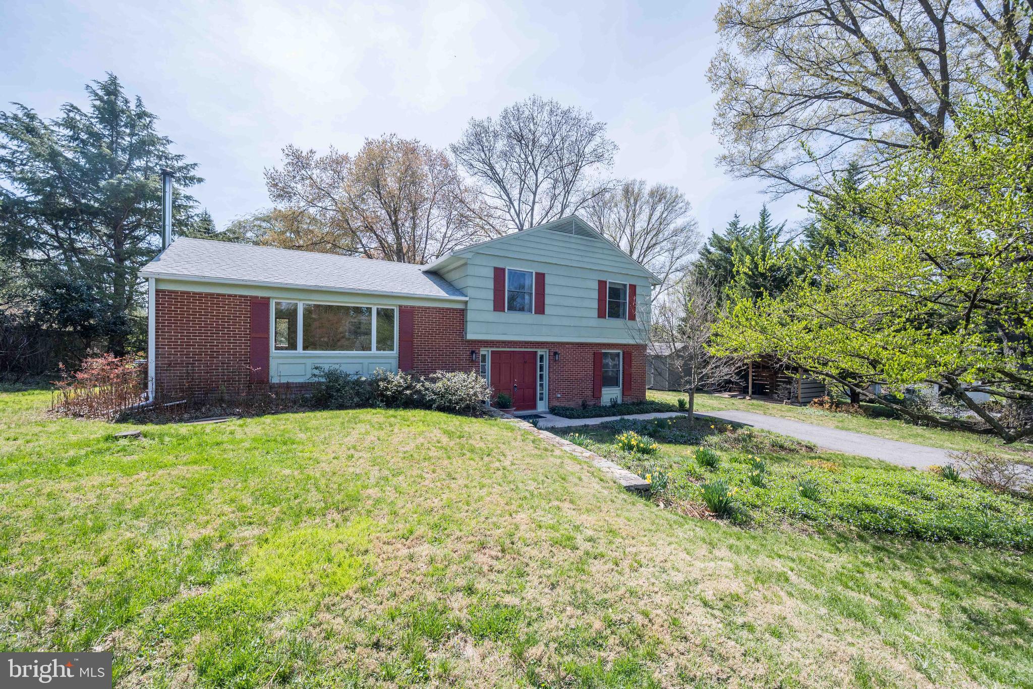 9221 Spring Valley Road Ellicott City, MD 21043 - Photo 4 of 47 a view of a house with a yard