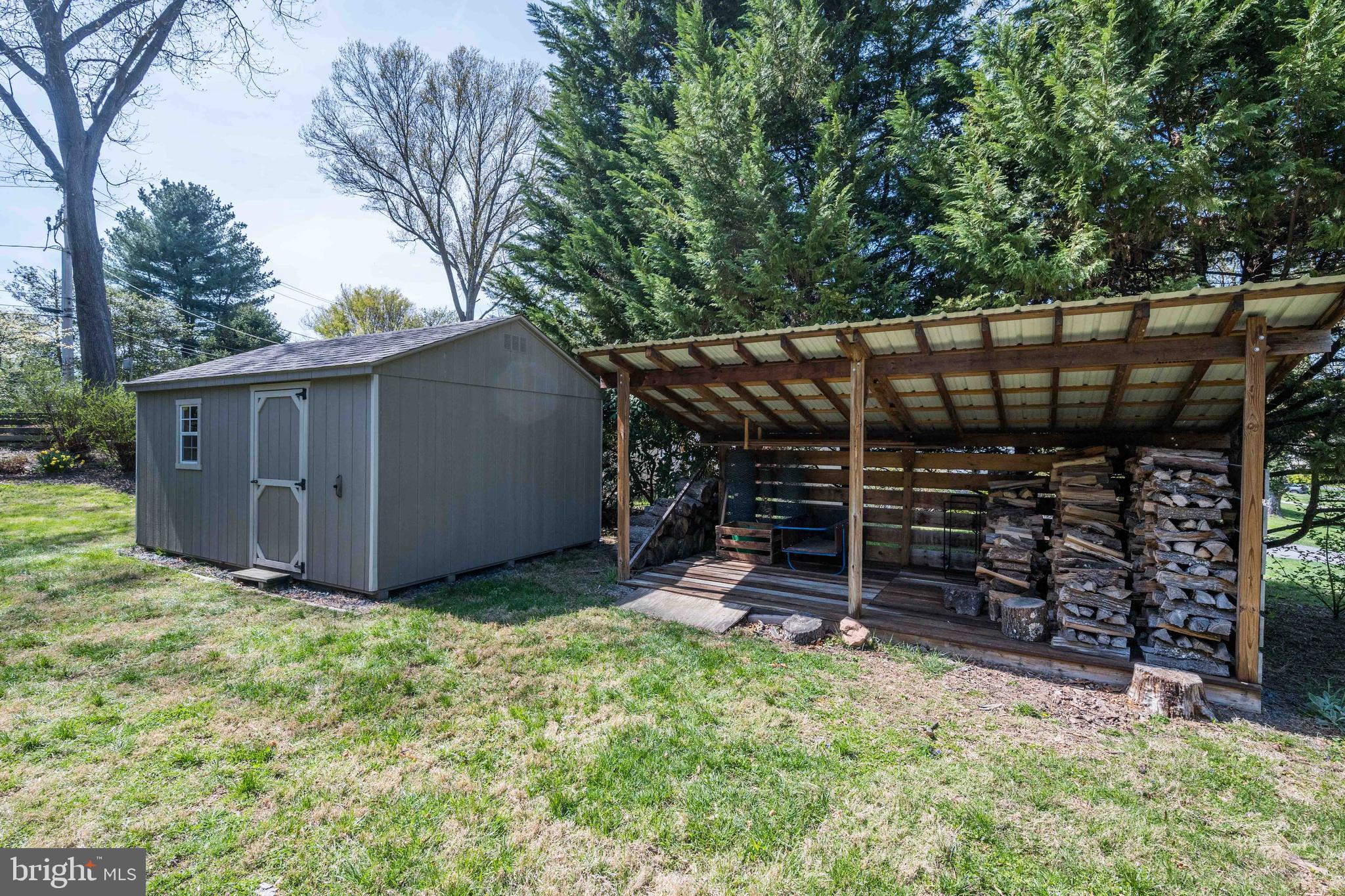 9221 Spring Valley Road Ellicott City, MD 21043 - Photo 45 of 47 a view of a backyard with wooden fence
