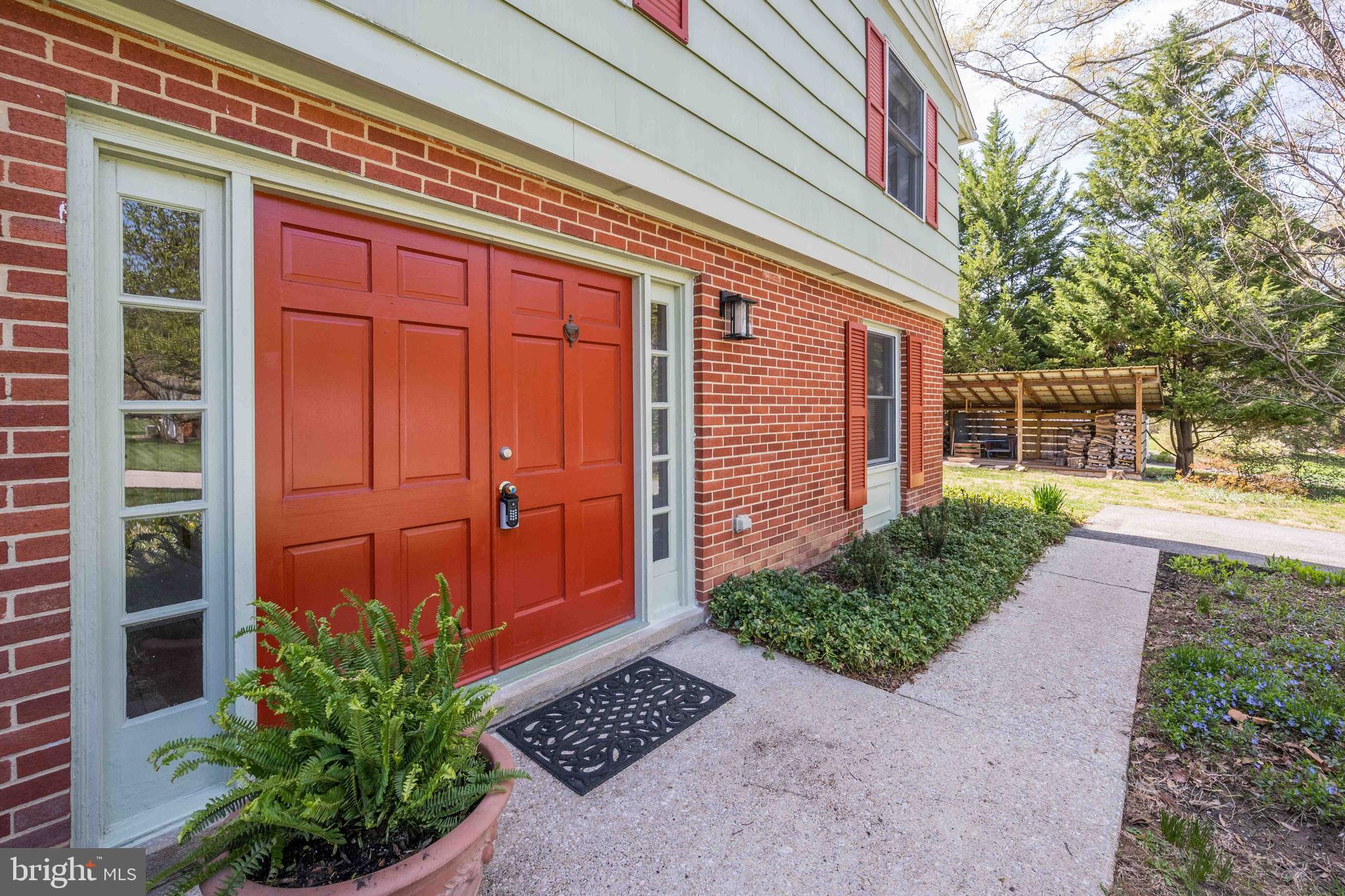 9221 Spring Valley Road Ellicott City, MD 21043 - Photo 5 of 47 a view of a pathway with a house