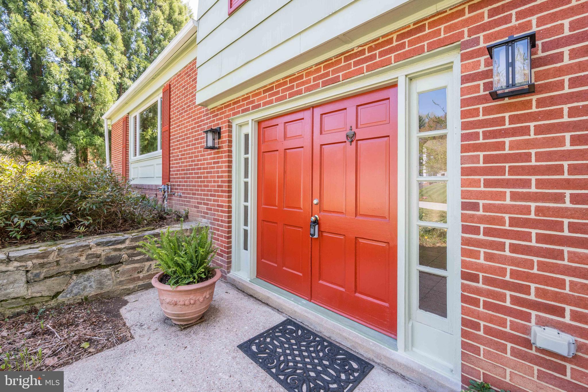 9221 Spring Valley Road Ellicott City, MD 21043 - Photo 6 of 47 a front view of a house with chairs