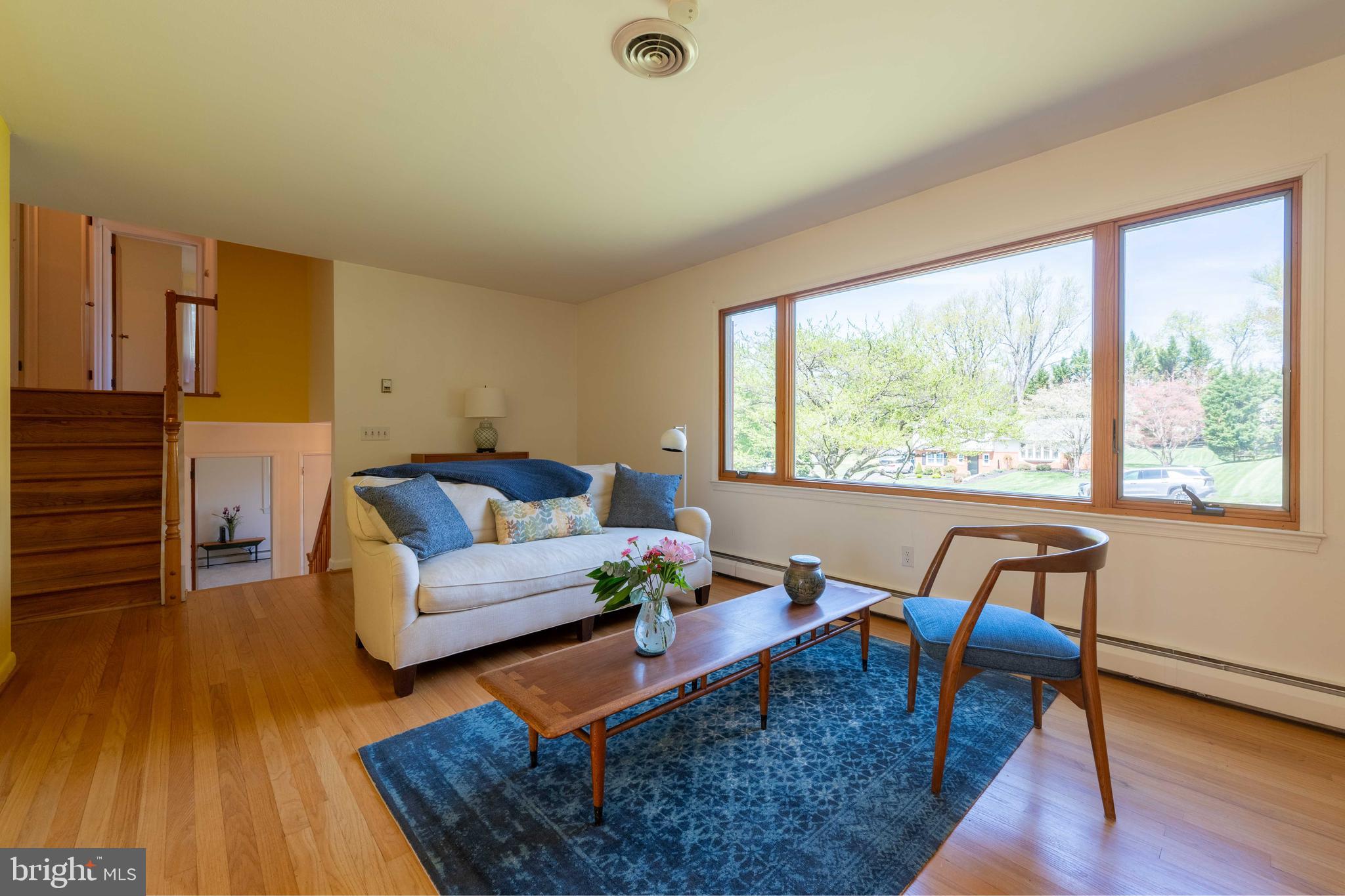 9221 Spring Valley Road Ellicott City, MD 21043 - Photo 8 of 47 a living room with furniture and a large window