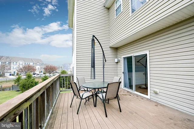 a view of balcony with furniture