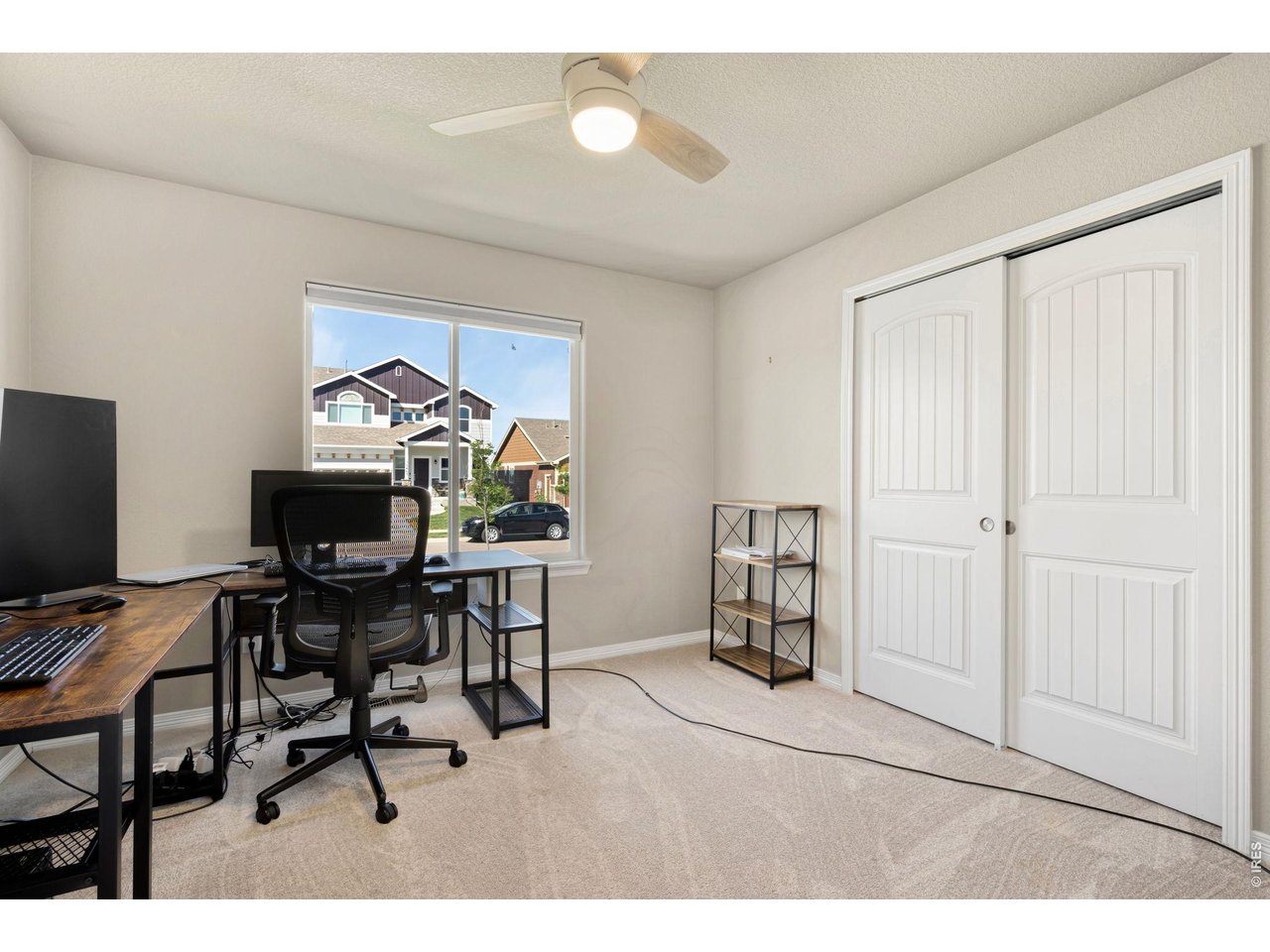 5492 Bristow Road Timnath, CO 80547 - Photo 11 of 25 Main level includes three well-appointed bedrooms
