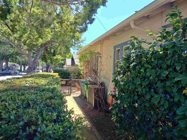 a view of a backyard with garden