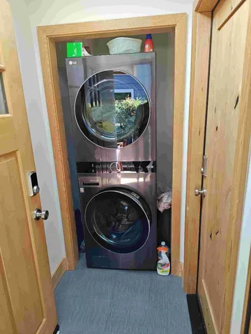 a utility room with dryer and washer