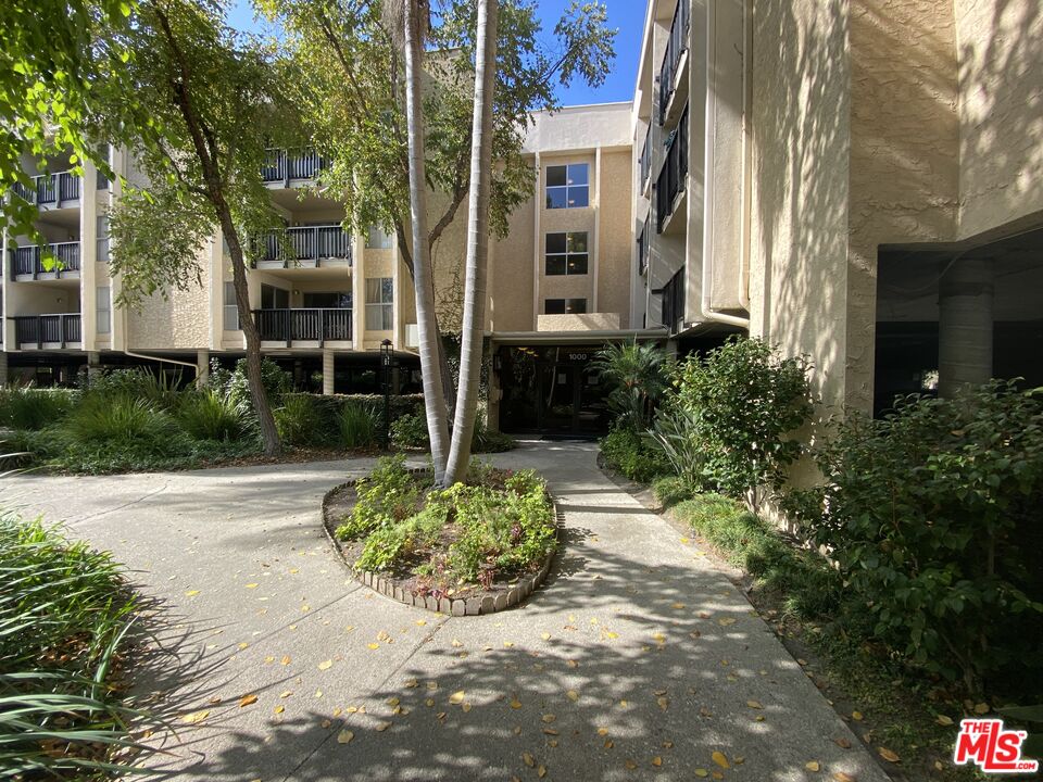 1101 Raintree Circle, Unit 101 Culver City, CA 90230 - Photo 1 of 12 a view of a back yard of the house