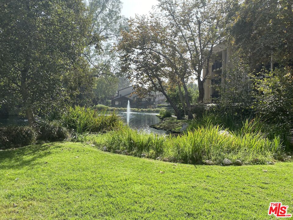 1101 Raintree Circle, Unit 101 Culver City, CA 90230 - Photo 2 of 12 a view of a garden