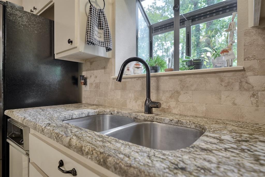 1649 Morningside Trail Hideaway, TX 75771 - Photo 14 of 40 a close view of a sink and tap