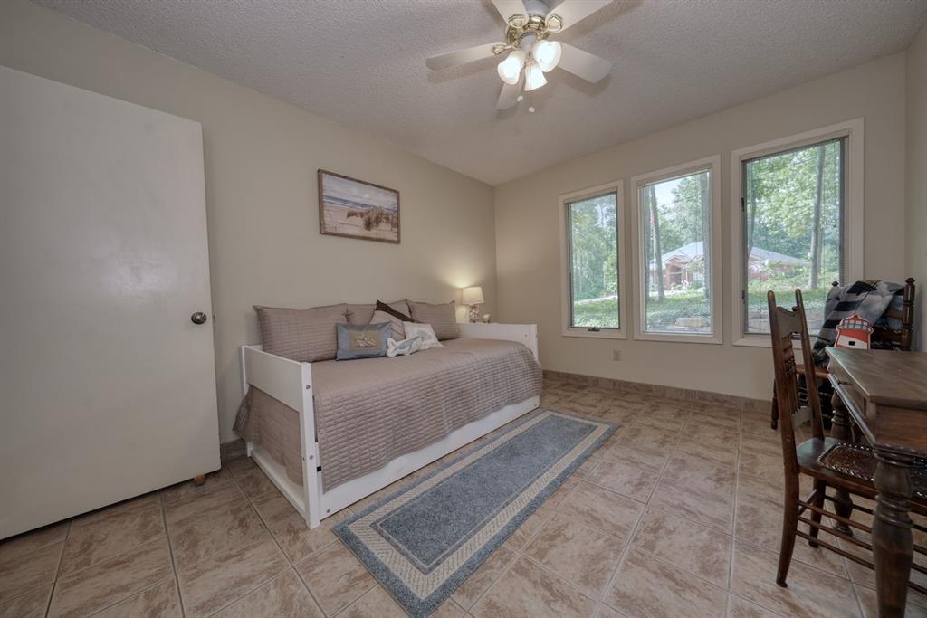 1649 Morningside Trail Hideaway, TX 75771 - Photo 33 of 40 a living room with furniture and a large window